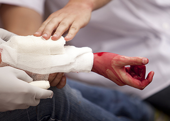 Bleeding arm and bandages
