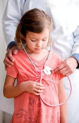 a girl standing with a doctor waering the doctor stethoscope