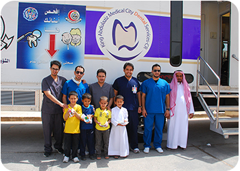 number of schoolers one of dentists’ visits in front of mobile clinic